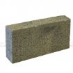 Single 100mm dense concrete block with a rough texture, photographed on a white background. Standard size 440mm x 215mm x 100mm, suitable for loadbearing and structural use