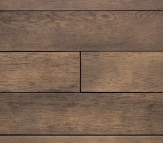 Detailed view of Millboard Enhanced Grain decking boards in a rich brown finish, featuring authentic wood-effect textures and fine-grain detailing for a natural timber look