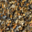 Close-up of 20mm Newbury Style flint gravel showcasing natural buff, grey, and amber tones